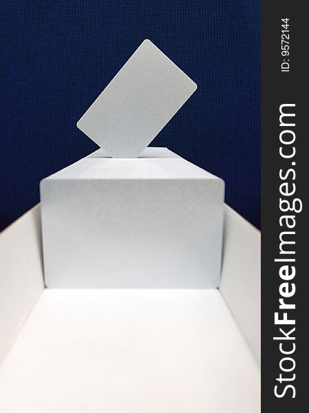 Clean silver plastic cards are placed in a box