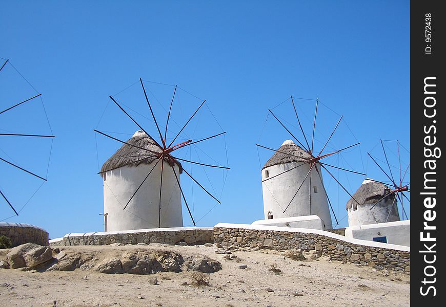 Greek windmills in Mykonos with blue sky