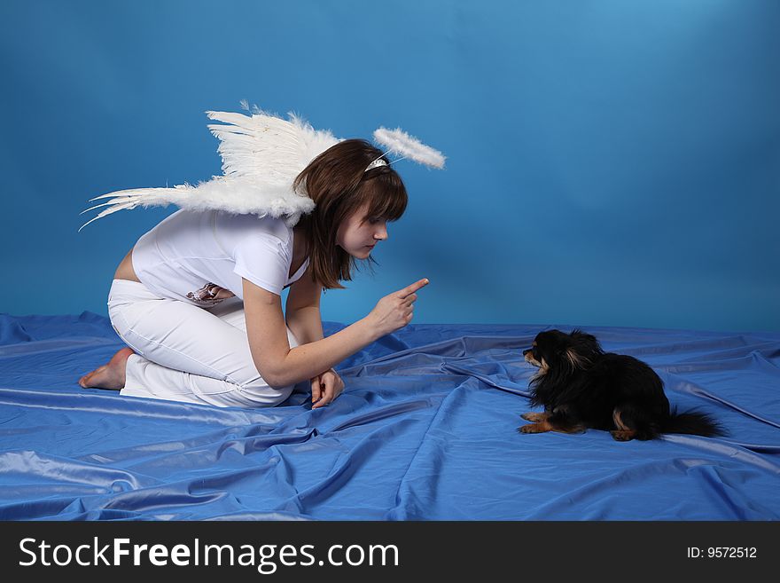 The girl an angel and doggy
