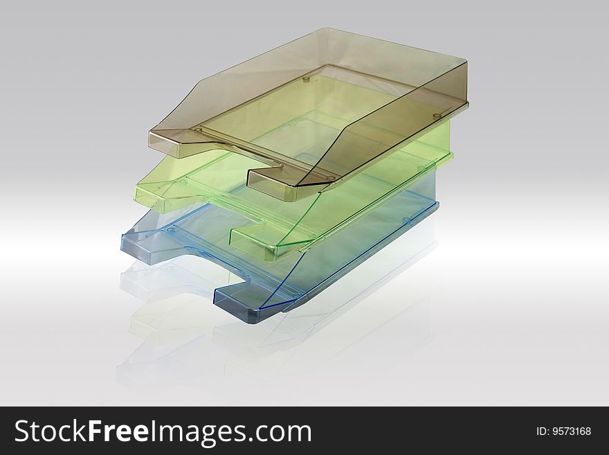 Three transparent folder stands for your office.