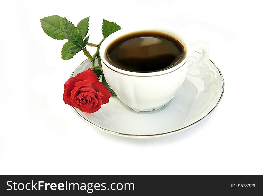Cup of coffee and small red rose isolated over white. Cup of coffee and small red rose isolated over white.