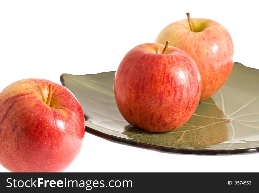 Red apples on the plate