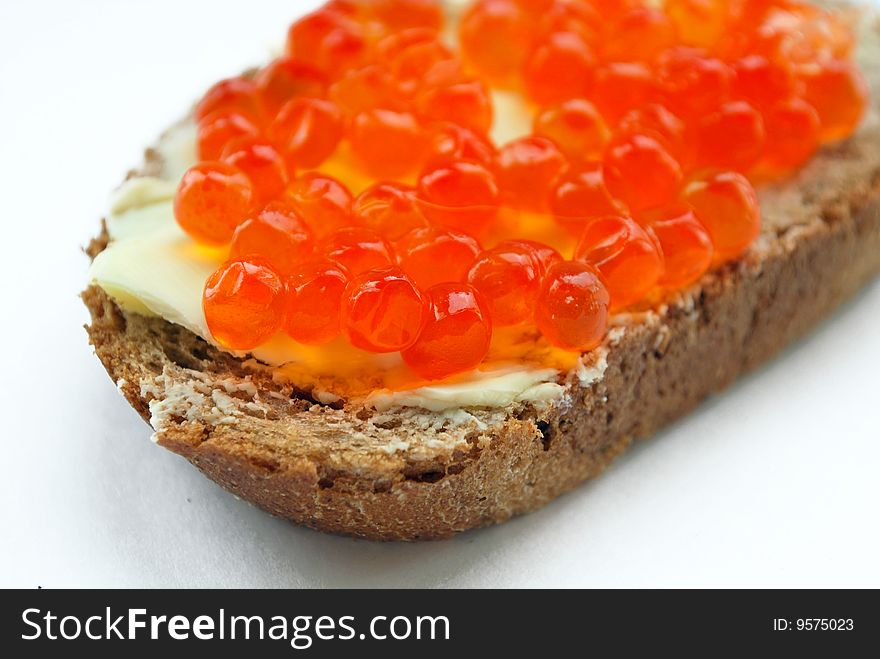 Sandwich with salmon caviar and butter. Sandwich with salmon caviar and butter
