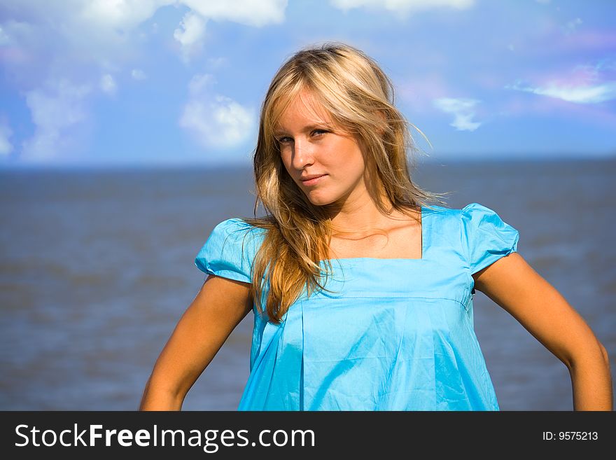 Portrait blondy girl in beach