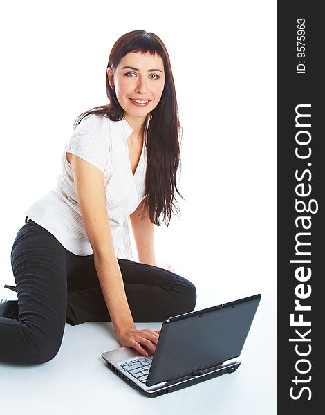 Young woman with laptop. Isolated on white background