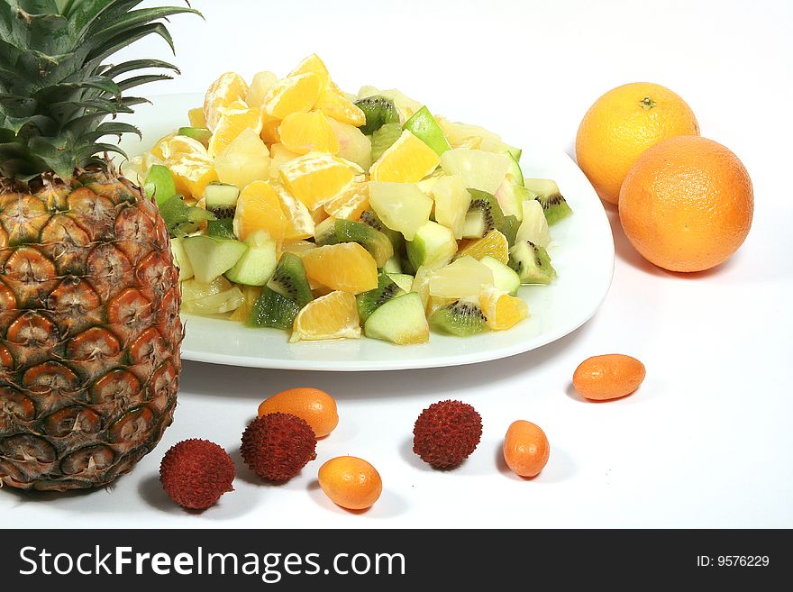 Pineapple with fruits on a plate