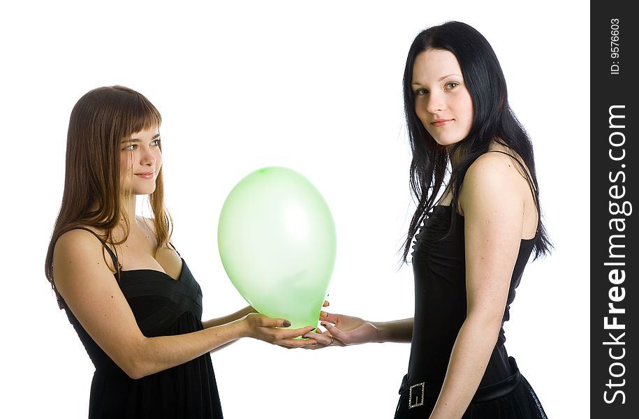 Two young girls with green balloons. Isolated on white background. Two young girls with green balloons. Isolated on white background