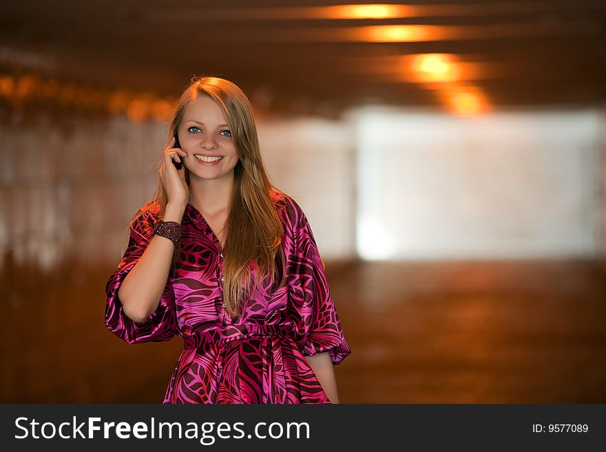 Portrait of contemplative woman talking on mobile phone