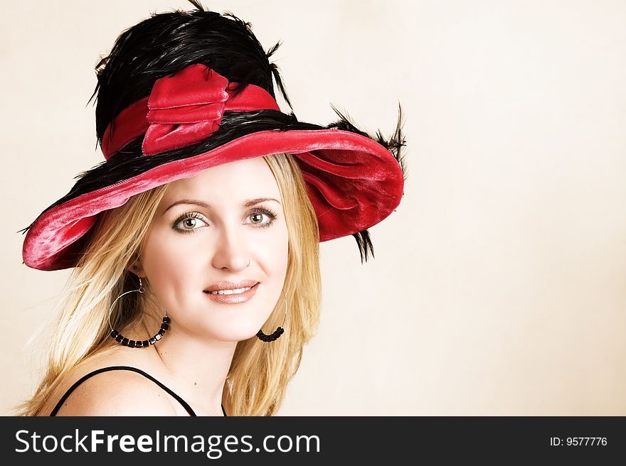 Beautiful young blond female wearing a hat. Beautiful young blond female wearing a hat