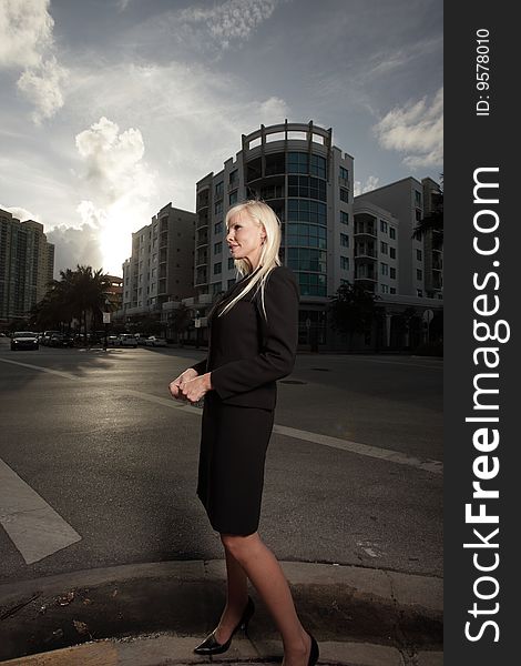 Profile of a young businesswoman on the street