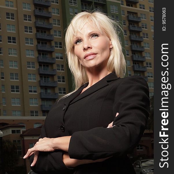 Businesswoman with a building in the background