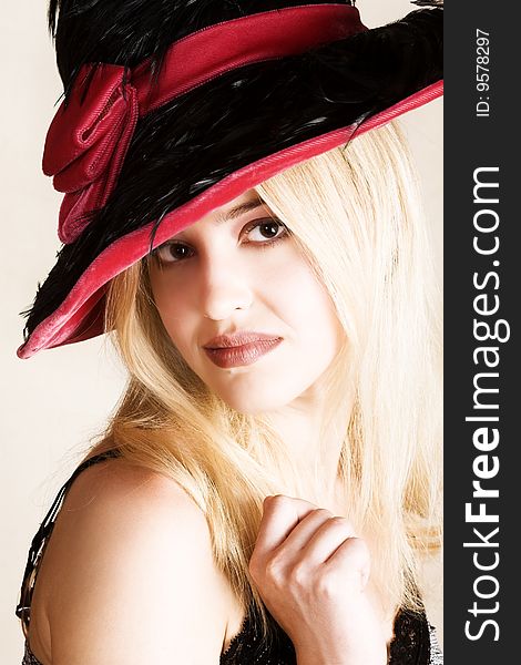 Beautiful young blond female wearing a hat. Beautiful young blond female wearing a hat
