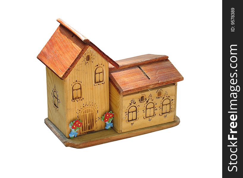 Small wooden toy house isolated over white background