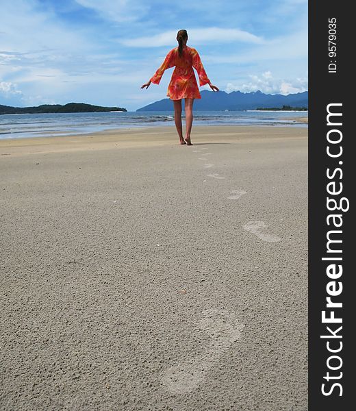 Young woman on a tropical beach of Langkawi island, Malaysia. Young woman on a tropical beach of Langkawi island, Malaysia