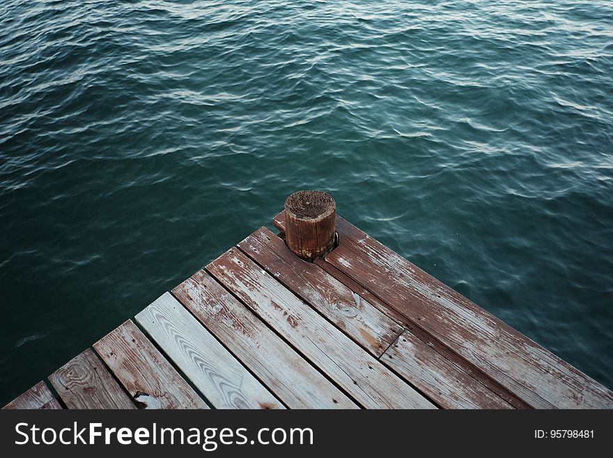 Dark Green Sea Water Wooden Pier