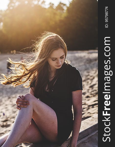 Portrait of woman outdoors on boardwalk