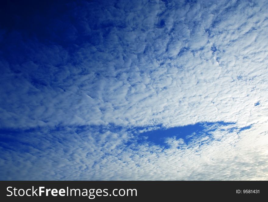 Blue and white, clouds and sky.