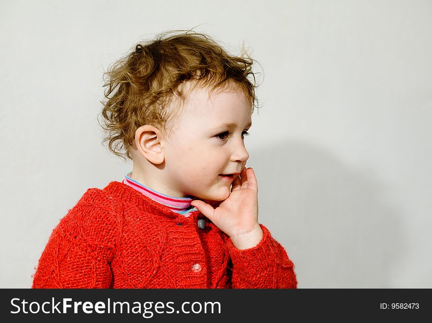 Smiling little boy  with dishevelled hair