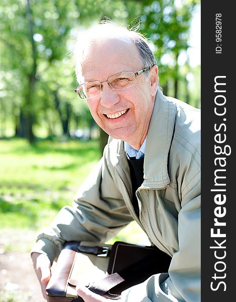 Portrait of the cheerful mature businessman