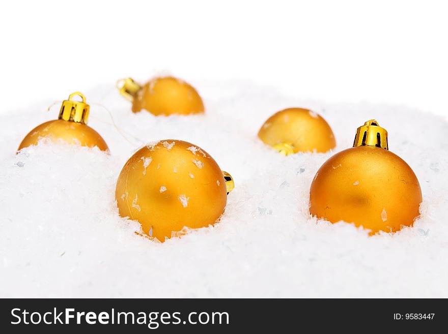 Christmas balls with snow isolated on white.