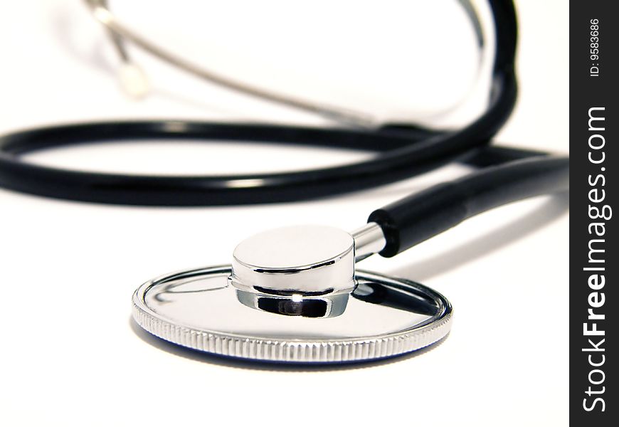 Medical stethoscope close-up on white background
