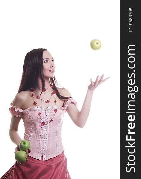 Brunette girl with fruit  - three green apples