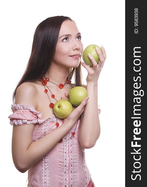 Brunette girl with fruit three freen apples