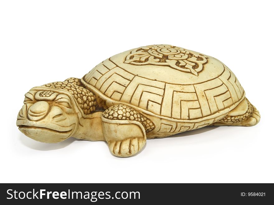 Ceramic figurine of a turtle with drawing on an armour