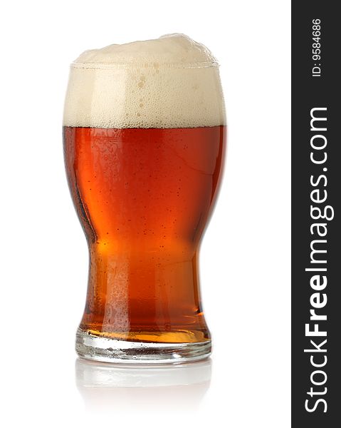 Cold glass of beer over white background