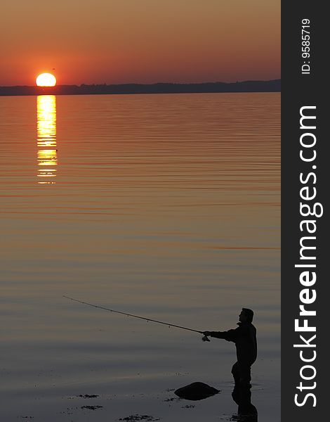 Fishing in a beautiful sunset. Fishing in a beautiful sunset