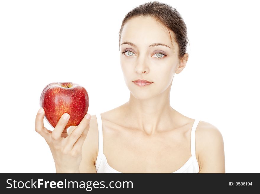 Young woman holding red apple isolated over white background