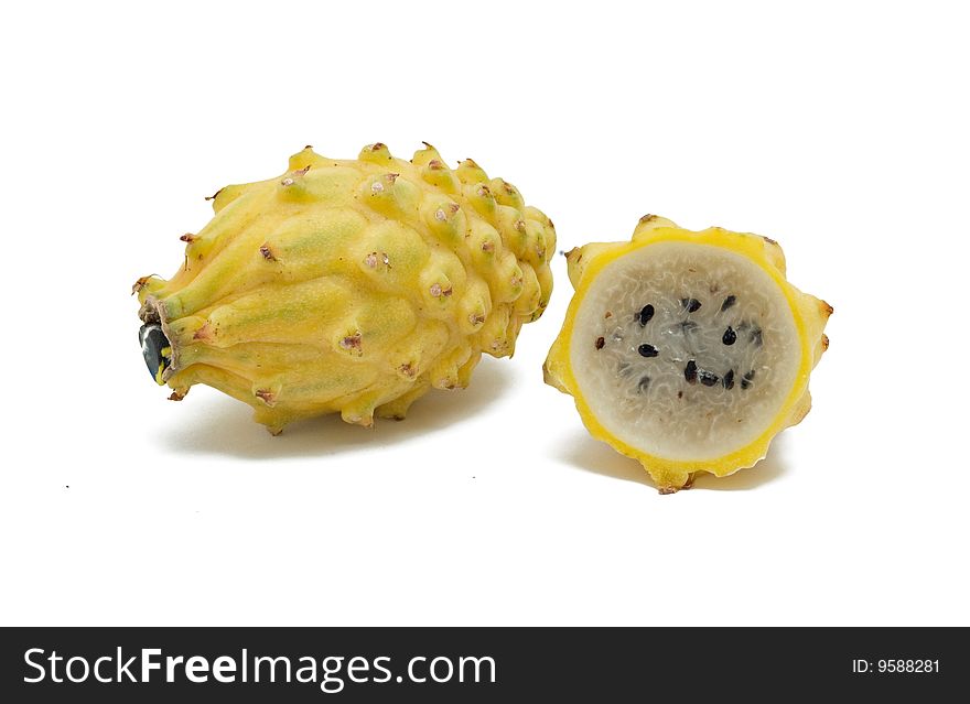 Yellow dragon fruit and its section isolated on white background