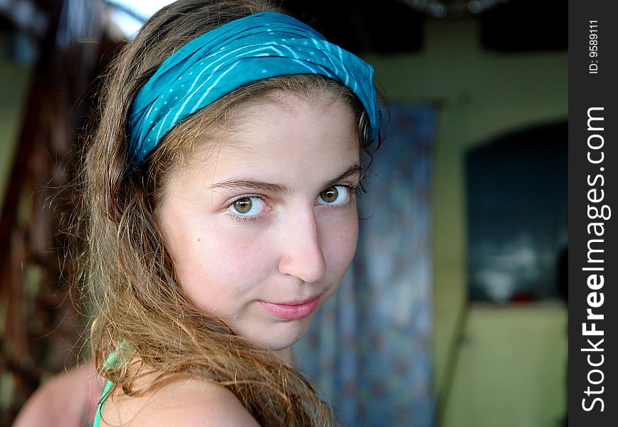 Casual portrait of a young girl with a blue bandage. Casual portrait of a young girl with a blue bandage