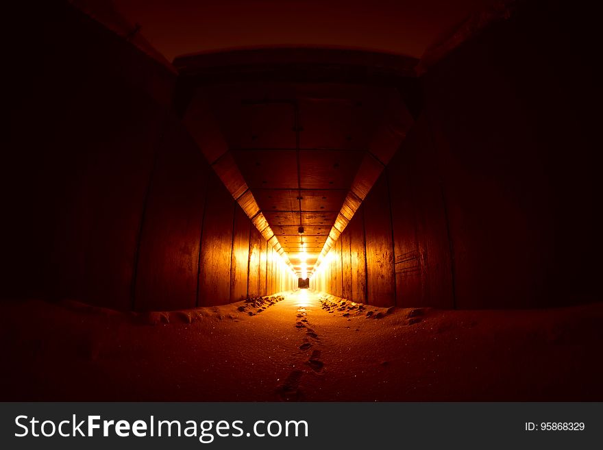 Tunnel illuminated with lanterns at night. Tunnel illuminated with lanterns at night.