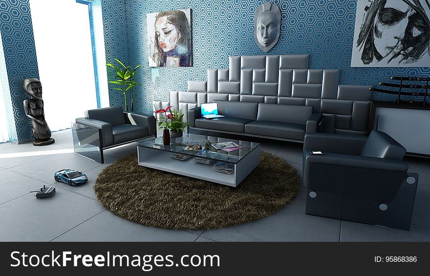 Interior of modern apartment living room with leather sofa and chairs and pop art pictures.
