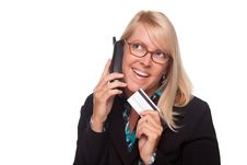 Beautiful Blonde Woman With Phone And Credit Card Royalty Free Stock Image