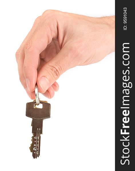 Hand holding keys isolated on white background