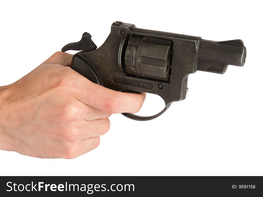 Revolver in hand - isolated on white background