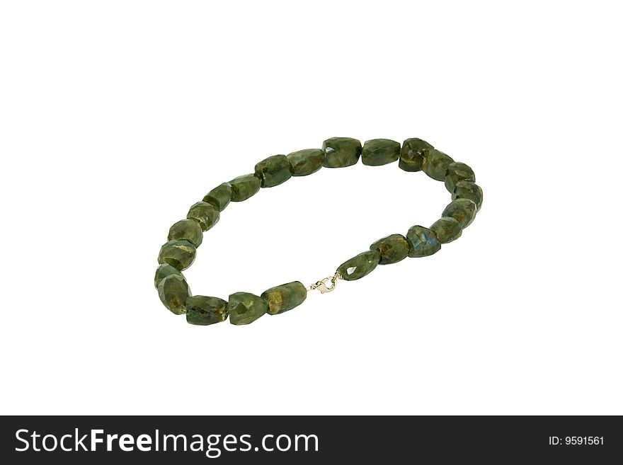 Beads, necklace from malachite on a white background