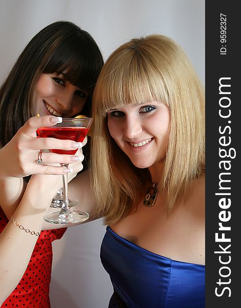 Two Pretty Friends With Cocktail