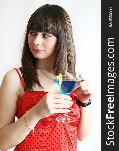 Portrait of young woman with cocktail. Portrait of young woman with cocktail