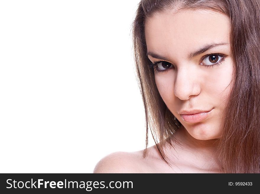 Beautiful woman face on a white background isolated