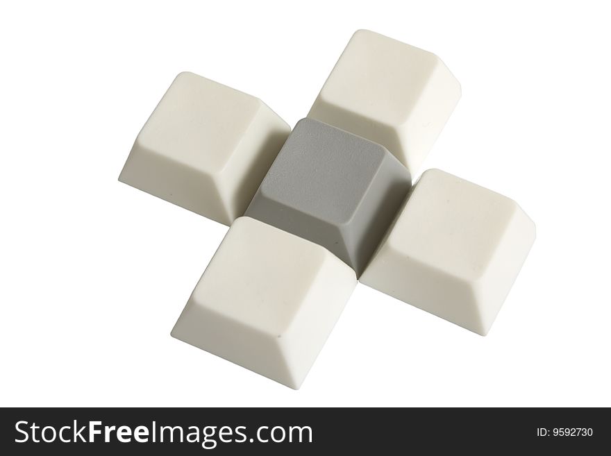 The cross from computer buttons is isolated on a white background. Clipping pach includet.