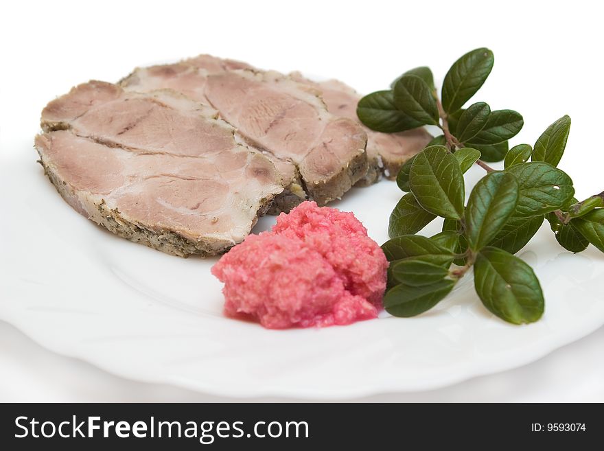 Succulent roast pork meat with horseradish