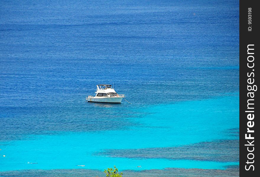 Honduran boat in blue coastal. Honduran boat in blue coastal