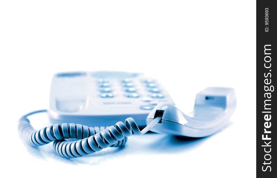 A telephone isolated on a white background, in blue. A telephone isolated on a white background, in blue