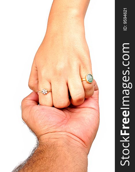 Male and female hands together over white background. Male and female hands together over white background.