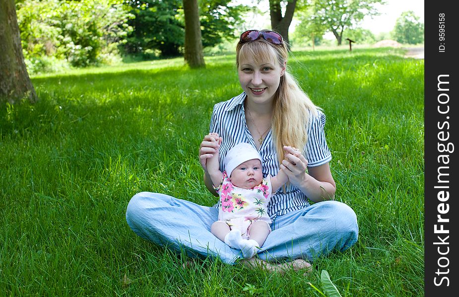 Baby And Mom Outdoors