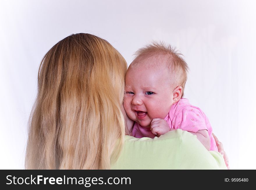 Loving mother holding newborn baby,