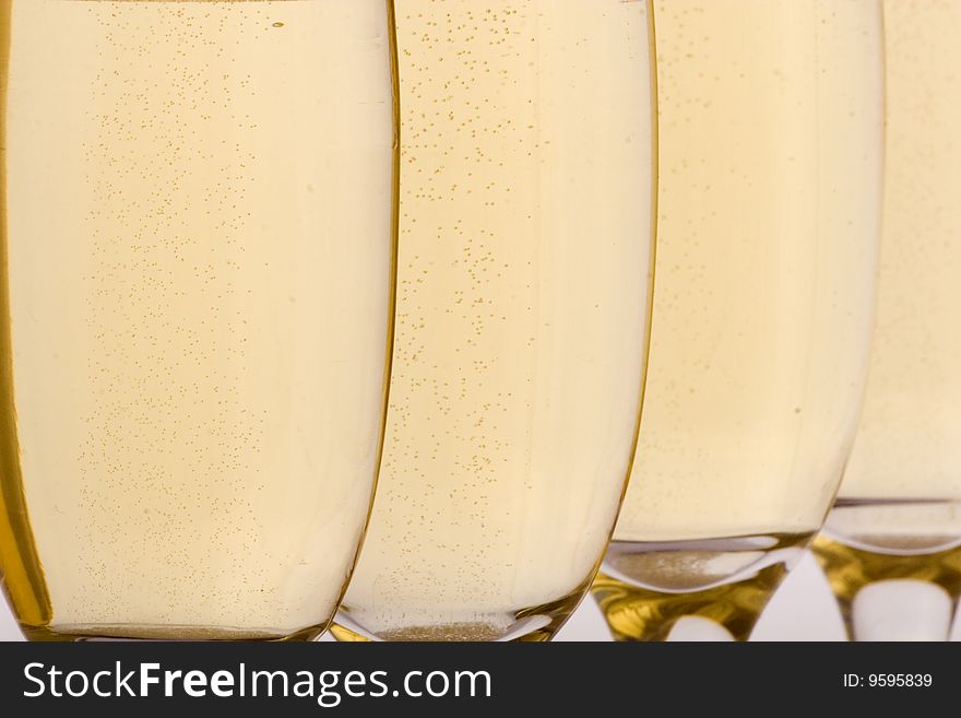 Champagne glass full of bubbly isolated on white